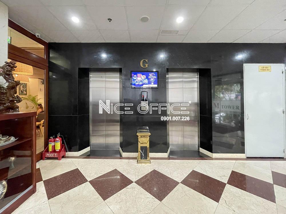 hai-thang-may-tai-toa-nha-km-tower